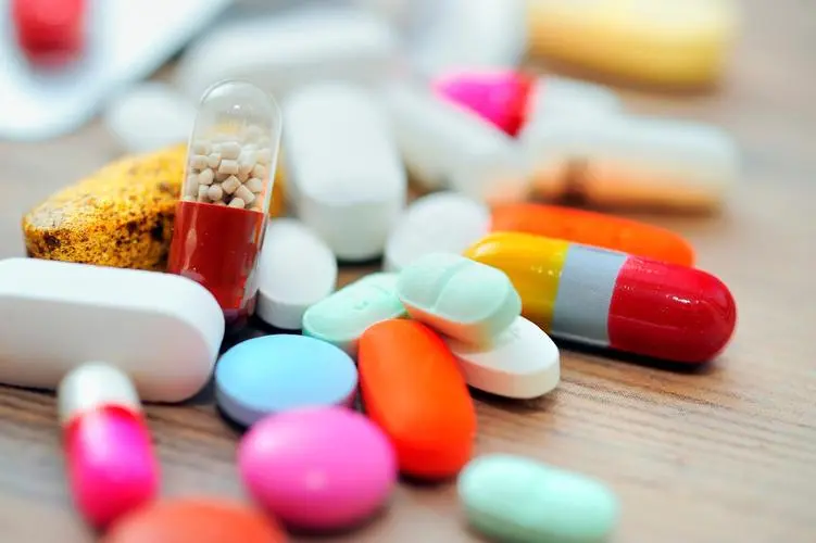 A variety of colorful pharmaceutical pills and capsules.