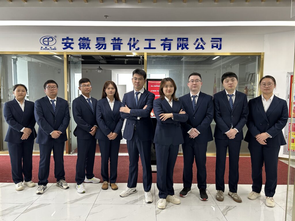 Team of Eapearl sales professionals in office attire standing in the company lobby.