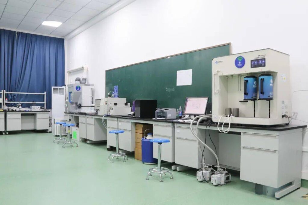 Modern research and development laboratory with advanced analytical equipment for spectroscopy and chromatography.